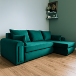 Modern L shaped 4-seater Berlin corner sofa bed in green velvet with pull-out bed and under-seat storage, styled in a contemporary living room