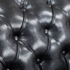 Front view of antique black PU leather Chesterfield sofa
