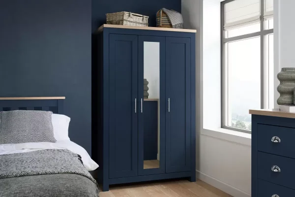 Highgate 3 door wardrobe with mirror navy blue and oak Farmhouse navy and oak wardrobe with full length mirror Highgate wardrobe with hanging rail and mirror Three door farmhouse wardrobe navy oak finish Navy blue painted wardrobe with oak detailing and mirror Highgate 3 door wardrobe classic bedroom design