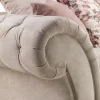 Modern Chesterfield sofa with scroll arms and beige upholstery
