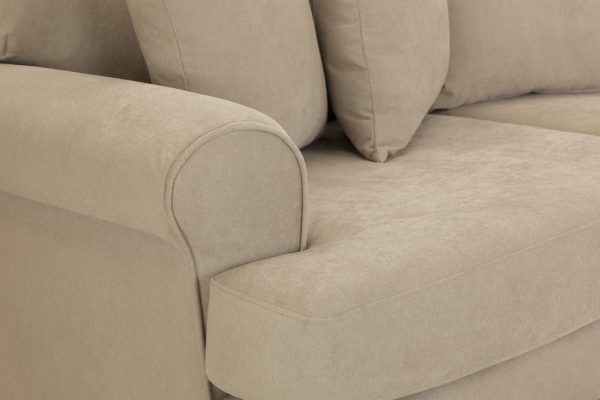 Elegant beige four-seater sofa with soft cushions