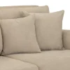 Elegant beige four-seater sofa with soft cushions